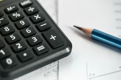 calculator and pencil