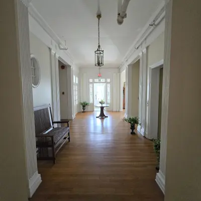 View from north end of the 1889 building into the 1924 addition entrance foyer.