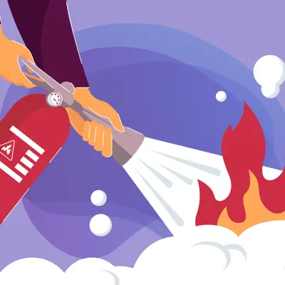 fireman using a fire extinguisher