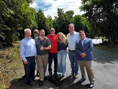 Members of the Yorktown Town Board with staff at the Downing commuter lot on August 18, 2025.