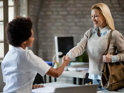two people shaking hands
