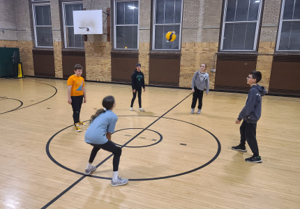 Yorktown Teen Center kids play basketball in the gym