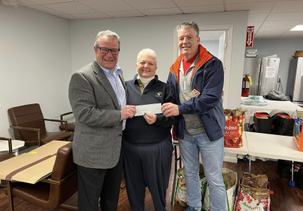 Yorktown Supervisor Tom Diana, Cindy Smith of St. Mary’s food pantry and Sen. Terrence Murphy hold a $2,000 check for St. Mary’s