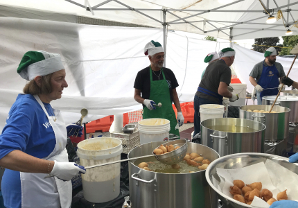 Volunteers from St. Patrick's Church prepare zeppole on September 18, 2024 at the Yorktown San Gennaro Feast. 