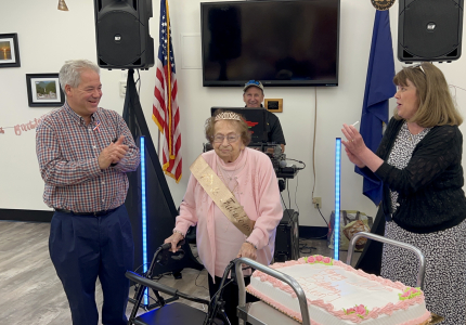 Yorktown Supervisor Ed Lachterman, left, with centenarian Kathleen Marencek, center, and senior center manager Noreen O'Driscoll