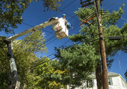Photo of a utility worker.