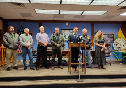Supervisor Matt Slater, members of the Town Board and Town officials discuss a golf course contract termination at Town Hall on 