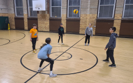 Yorktown Teen Center kids play basketball in the gym
