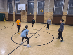 Yorktown Teen Center kids play basketball in the gym