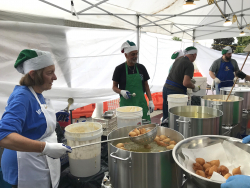 Volunteers from St. Patrick's Church prepare zeppole on September 18, 2024 at the Yorktown San Gennaro Feast. 