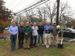 Yorktown officials at Downing Park with one of the trees that parks workers planted on November 1, 2024. 
