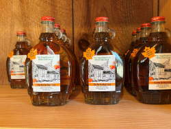 Image of White Oak Farm maple syrup bottles.