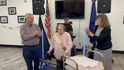 Yorktown Supervisor Ed Lachterman, left, with centenarian Kathleen Marencek, center, and senior center manager Noreen O'Driscoll