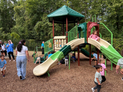 Children play on the new jungle gym at the Blackberry Woods playground on Sept. 10, 2025.