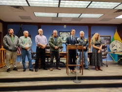 Supervisor Matt Slater, members of the Town Board and Town officials discuss a golf course contract termination at Town Hall on 